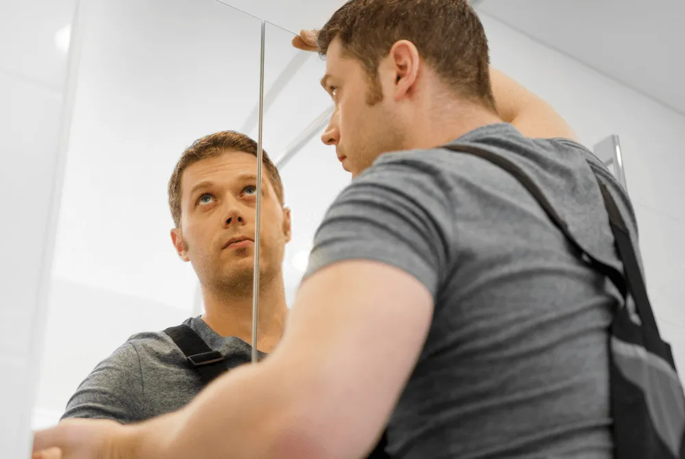 hang a large frameless mirror without using clips