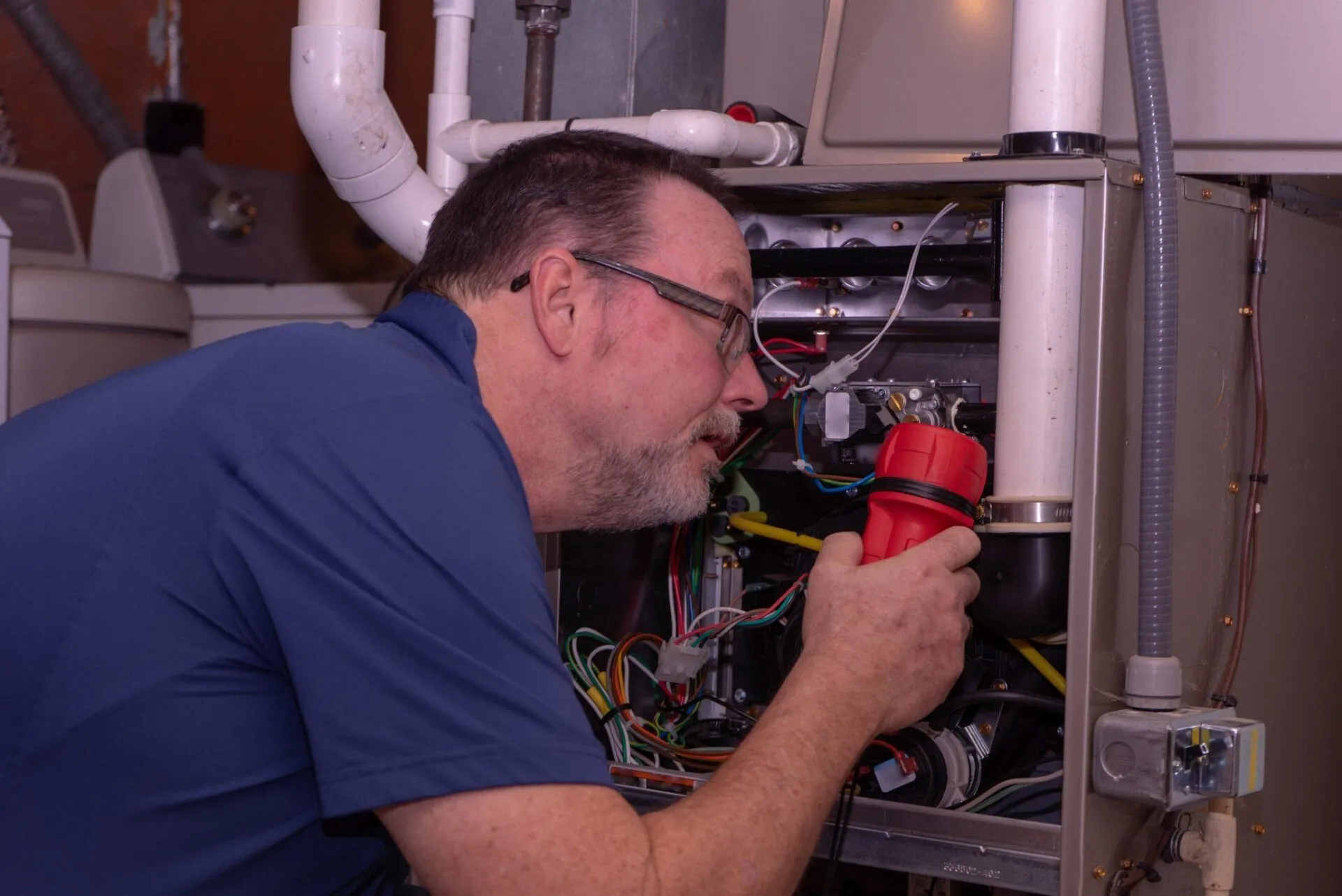 Tech Troubleshooting A Furnace Blue Shirt