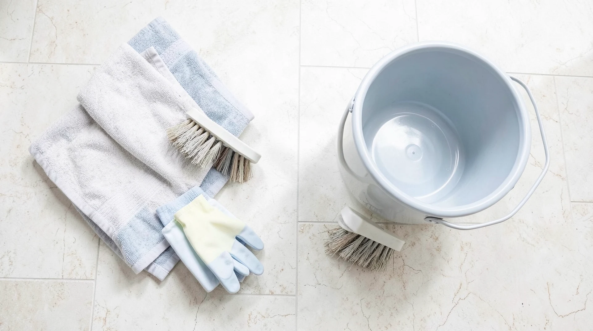 Kitchen cleaning supplies on floor